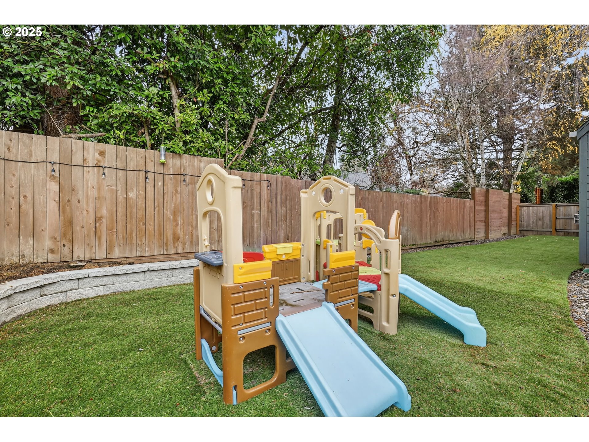 13140 Southwest Madison Court Beaverton, OR 97008 - Photo 41 of 48 a backyard of a house with table and chairs
