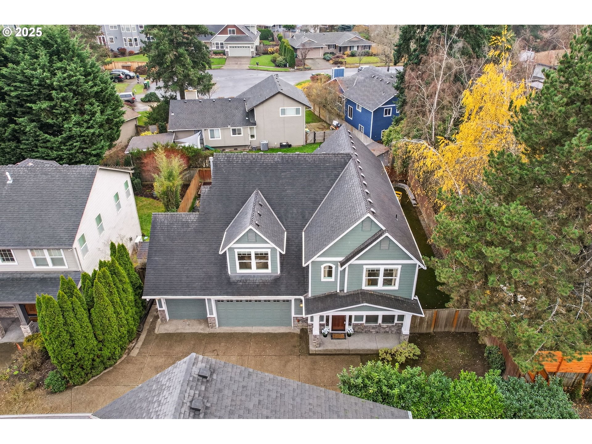 13140 Southwest Madison Court Beaverton, OR 97008 - Photo 45 of 48 an aerial view of residential houses with outdoor space and parking