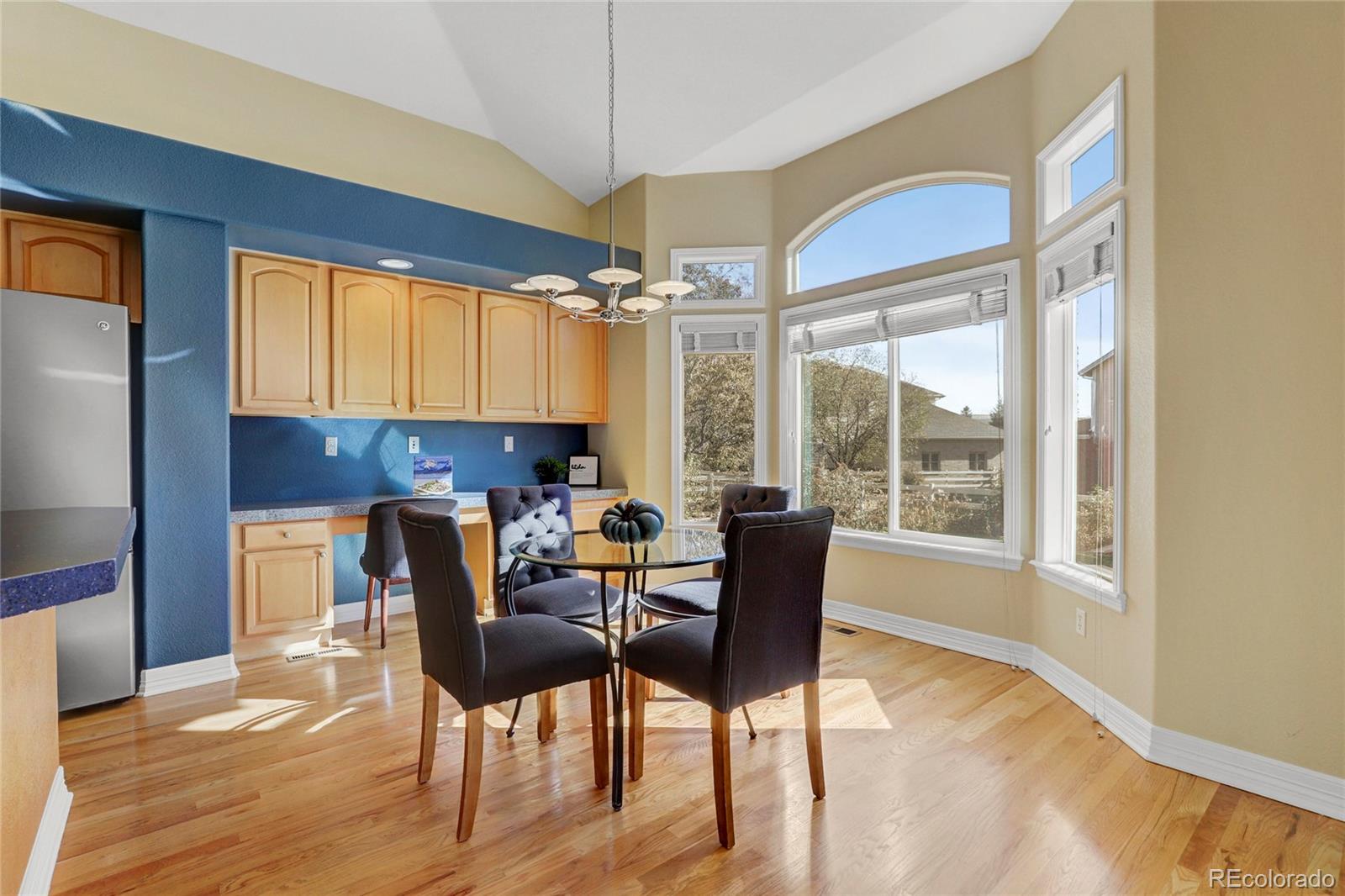 13810 Muirfield Circle Broomfield, CO 80023 - Photo 20 of 45 a dining room with furniture and window