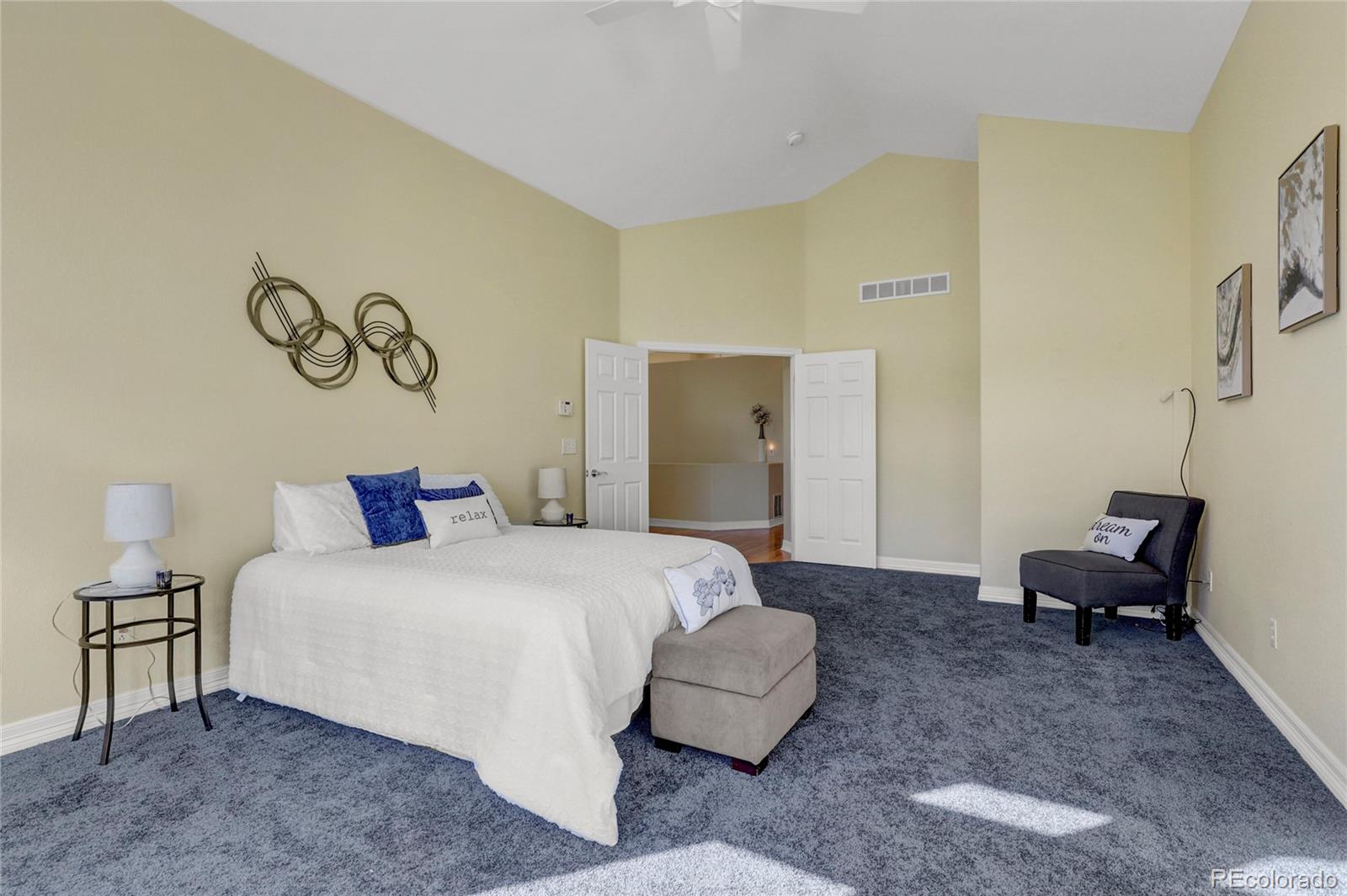 13810 Muirfield Circle Broomfield, CO 80023 - Photo 23 of 45 a bedroom with a bed and a table