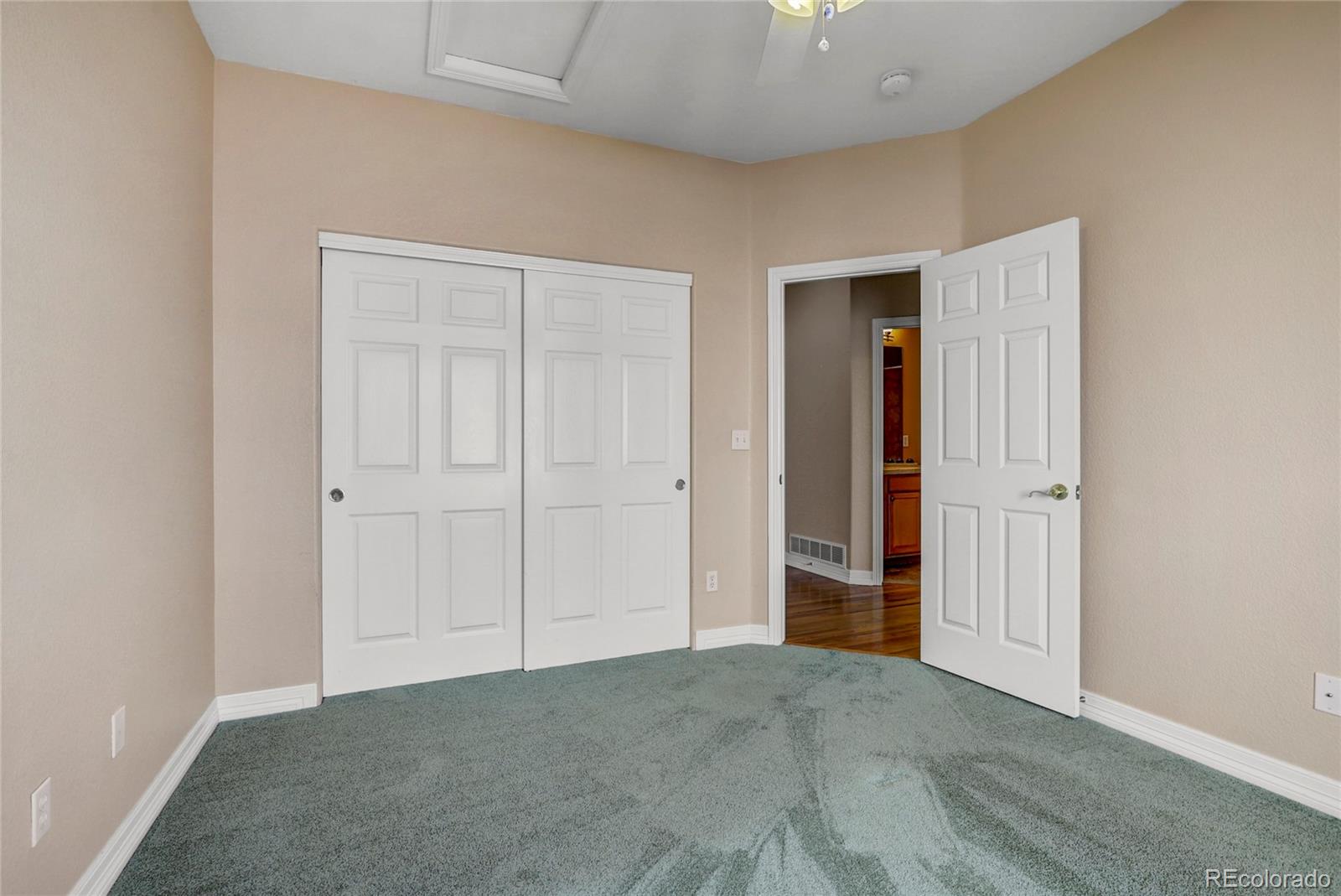 13810 Muirfield Circle Broomfield, CO 80023 - Photo 31 of 45 an empty room with closet area