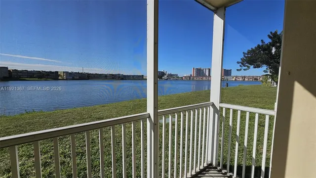a view of a bathroom with a sink and a shower