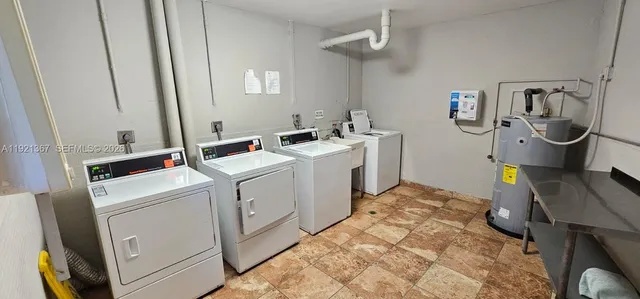 a view of a lake with a house in the background
