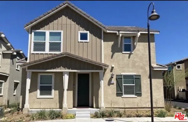 a front view of a house with windows