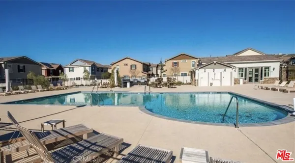 a view of a house with a swimming pool