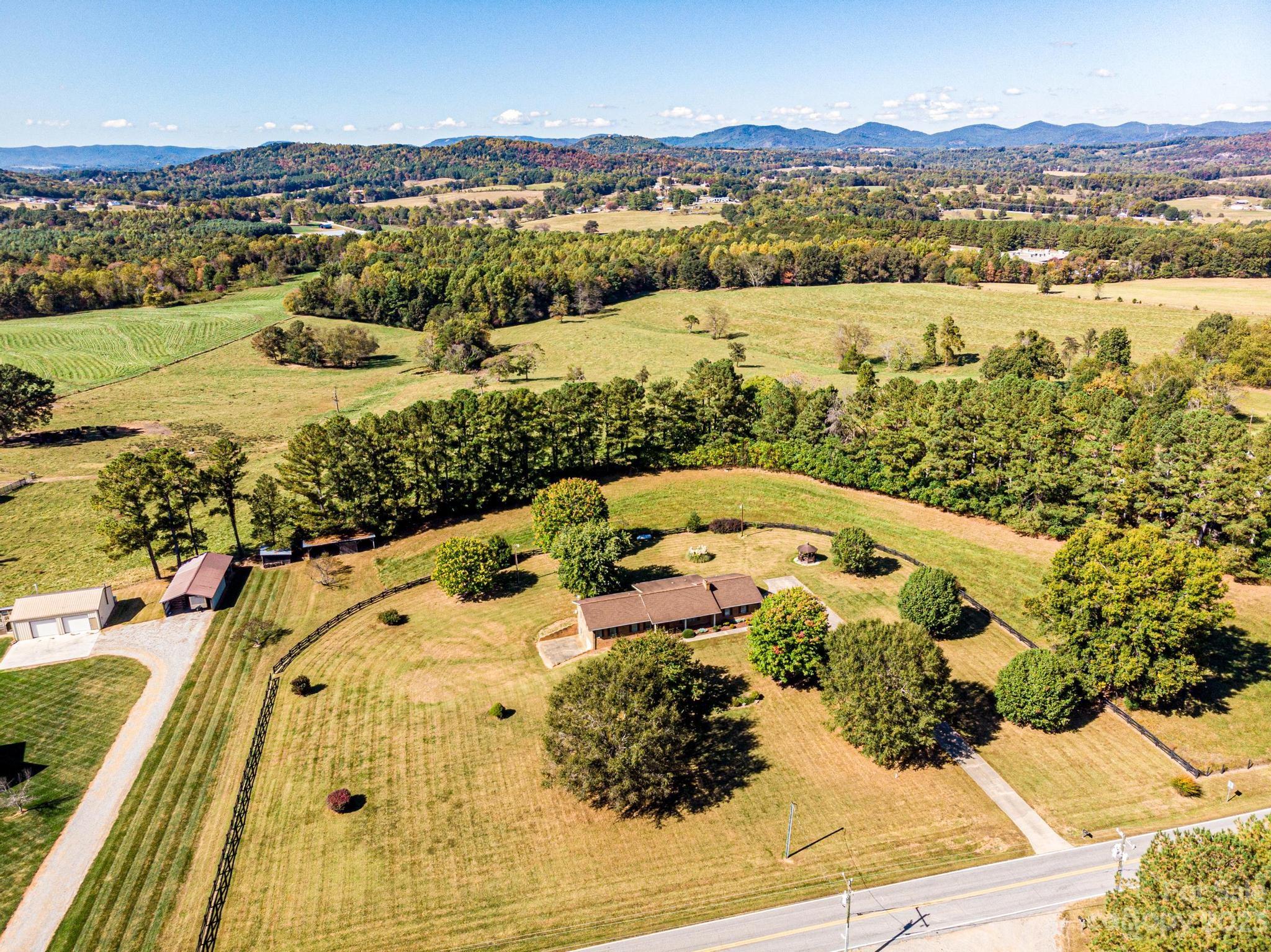 837 White Plains Road Hiddenite, NC 28636 - Photo 40 of 46 a view of a swimming pool with a lake view