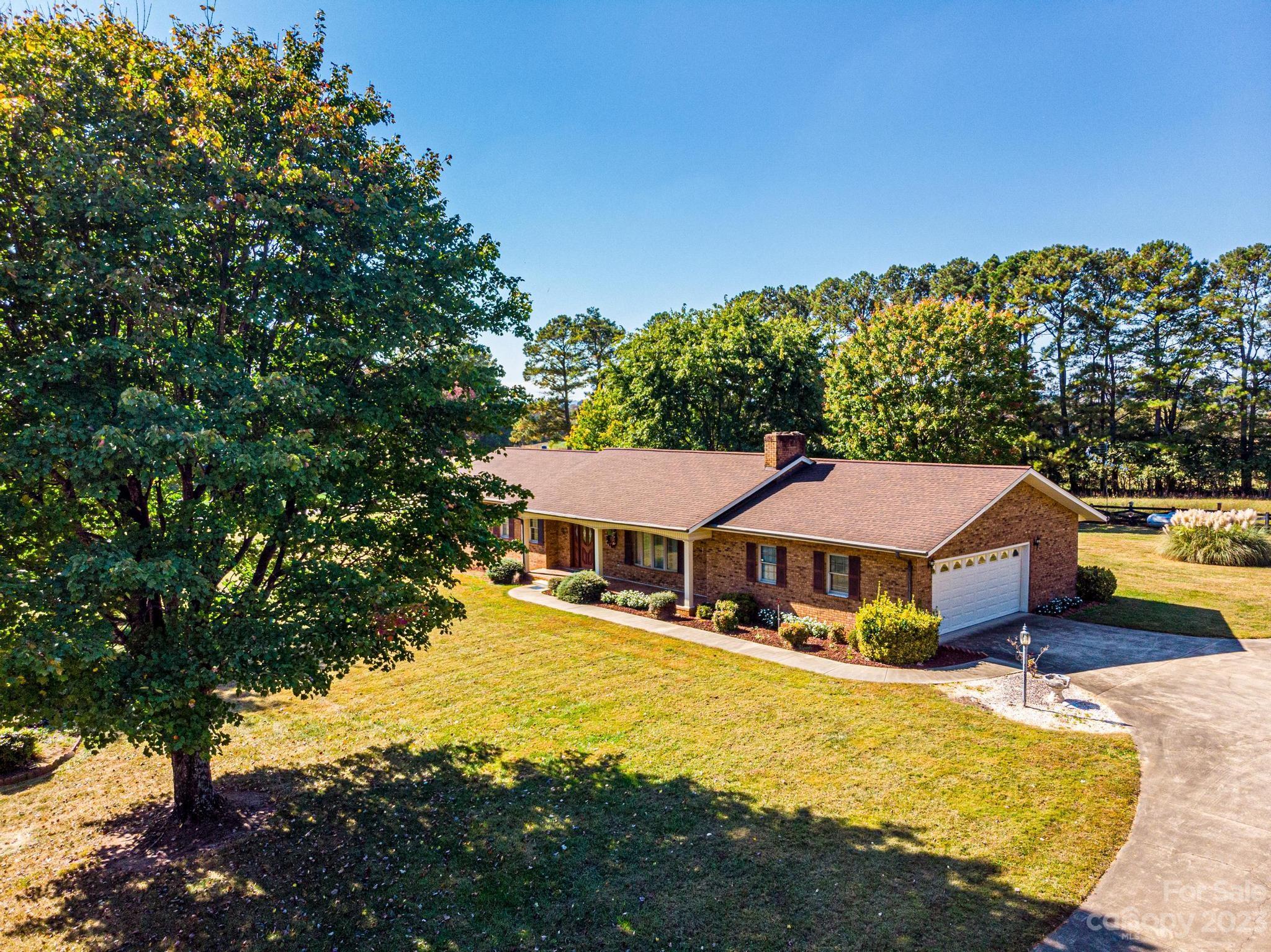 837 White Plains Road Hiddenite, NC 28636 - Photo 4 of 46 a swimming pool view with a outdoor seating