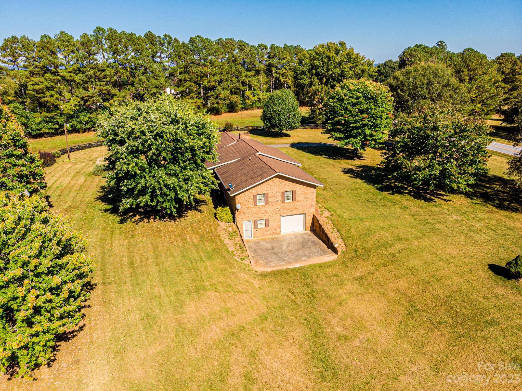 837 White Plains Road Hiddenite, NC 28636 - Photo 45 of 46 a view of a yard with swimming pool