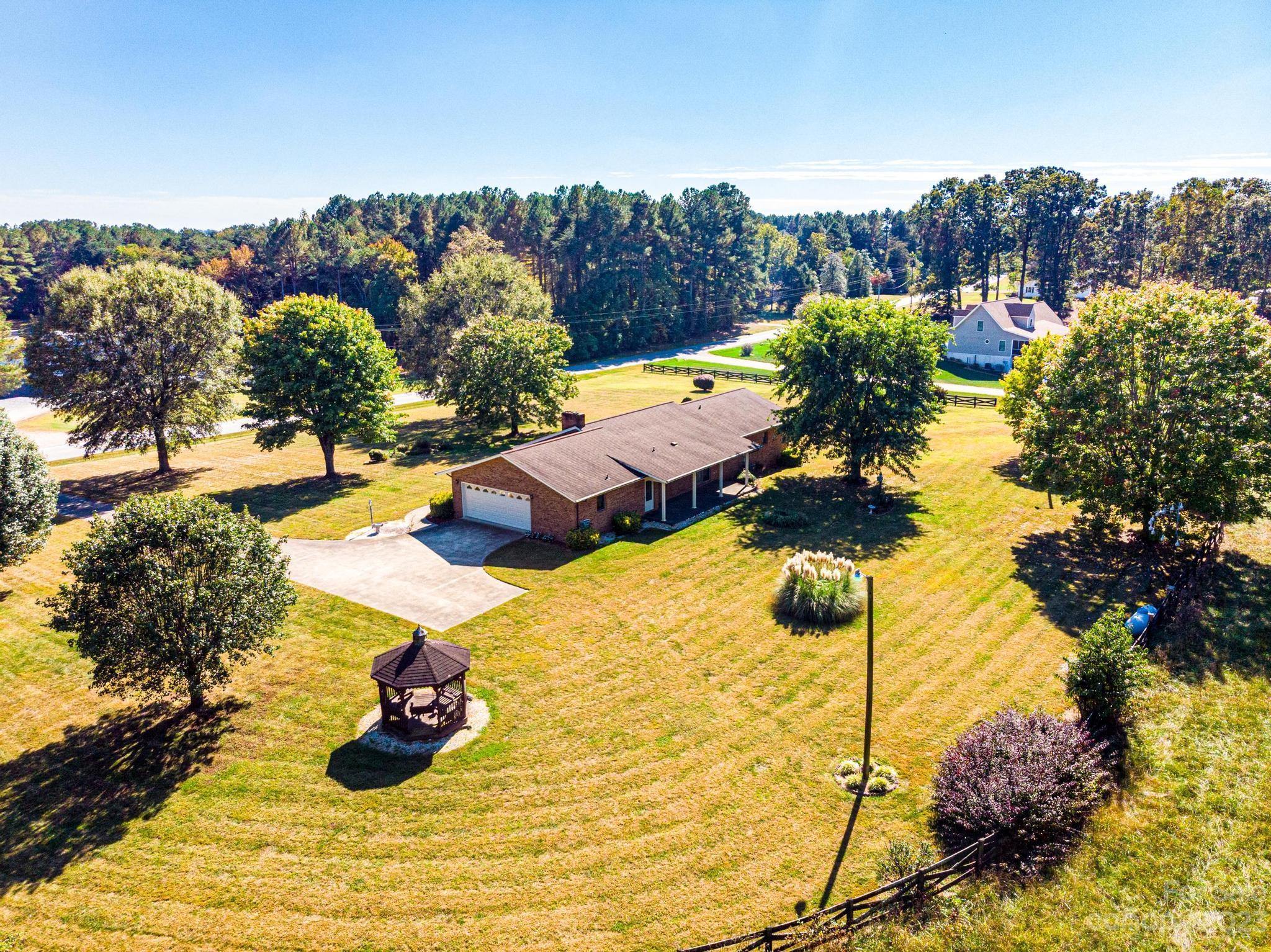 837 White Plains Road Hiddenite, NC 28636 - Photo 8 of 46 a view of a swimming pool with a yard