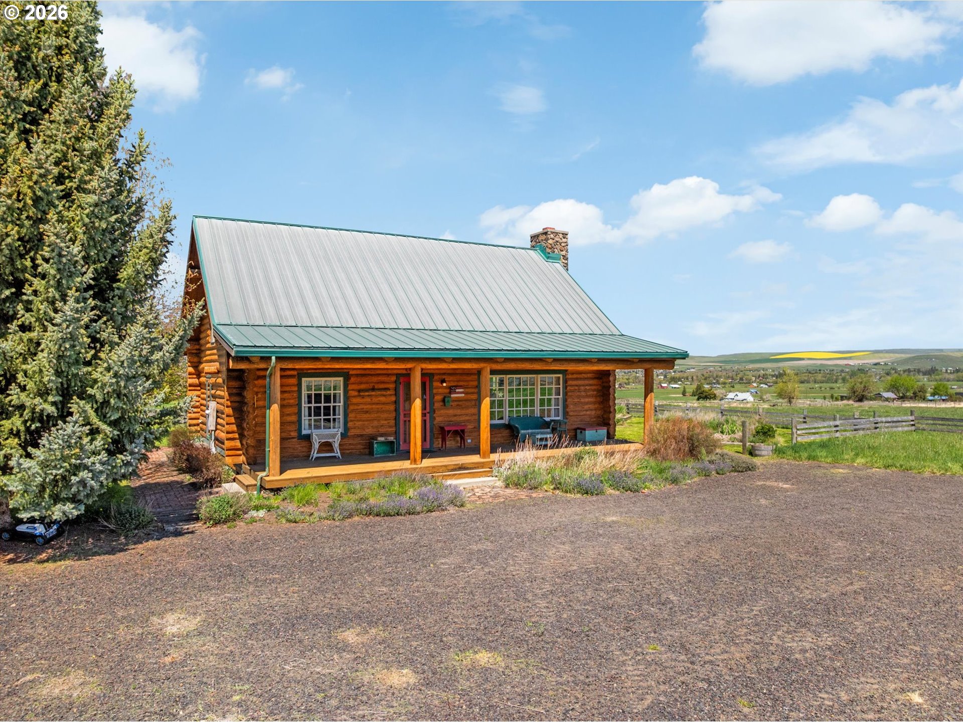 64782 Alder Slope Road Enterprise, OR 97828 - Photo 44 of 48 a front view of a house with a garden
