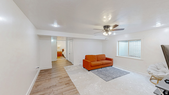 368 East 700 North Springville, UT 84663 - Photo 22 of 55 Living area featuring light wood-style floors and ceiling fan