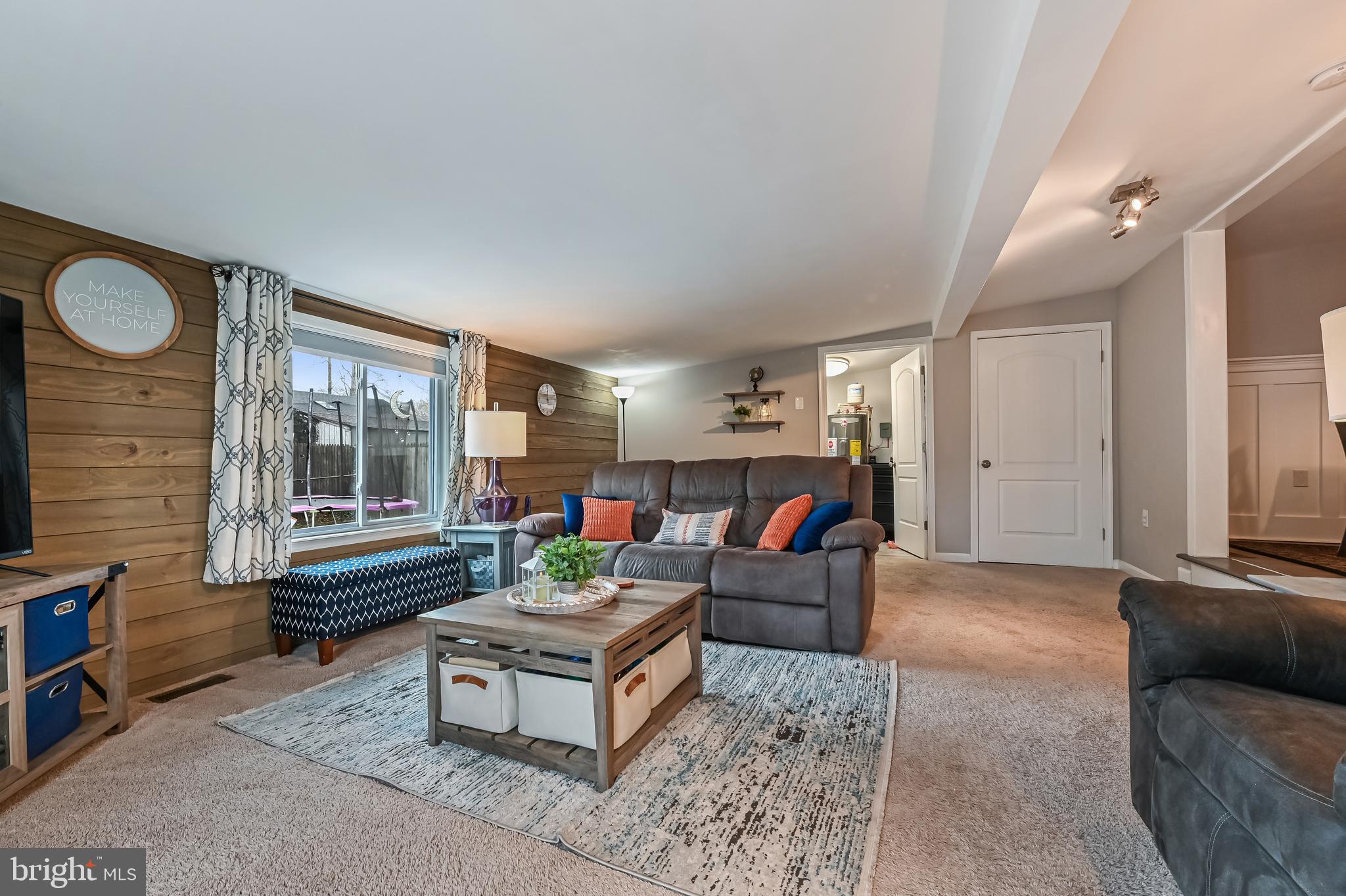 1609 Rockhold Road Edgewater, MD 21037 - Photo 12 of 35 a living room with furniture and a large window