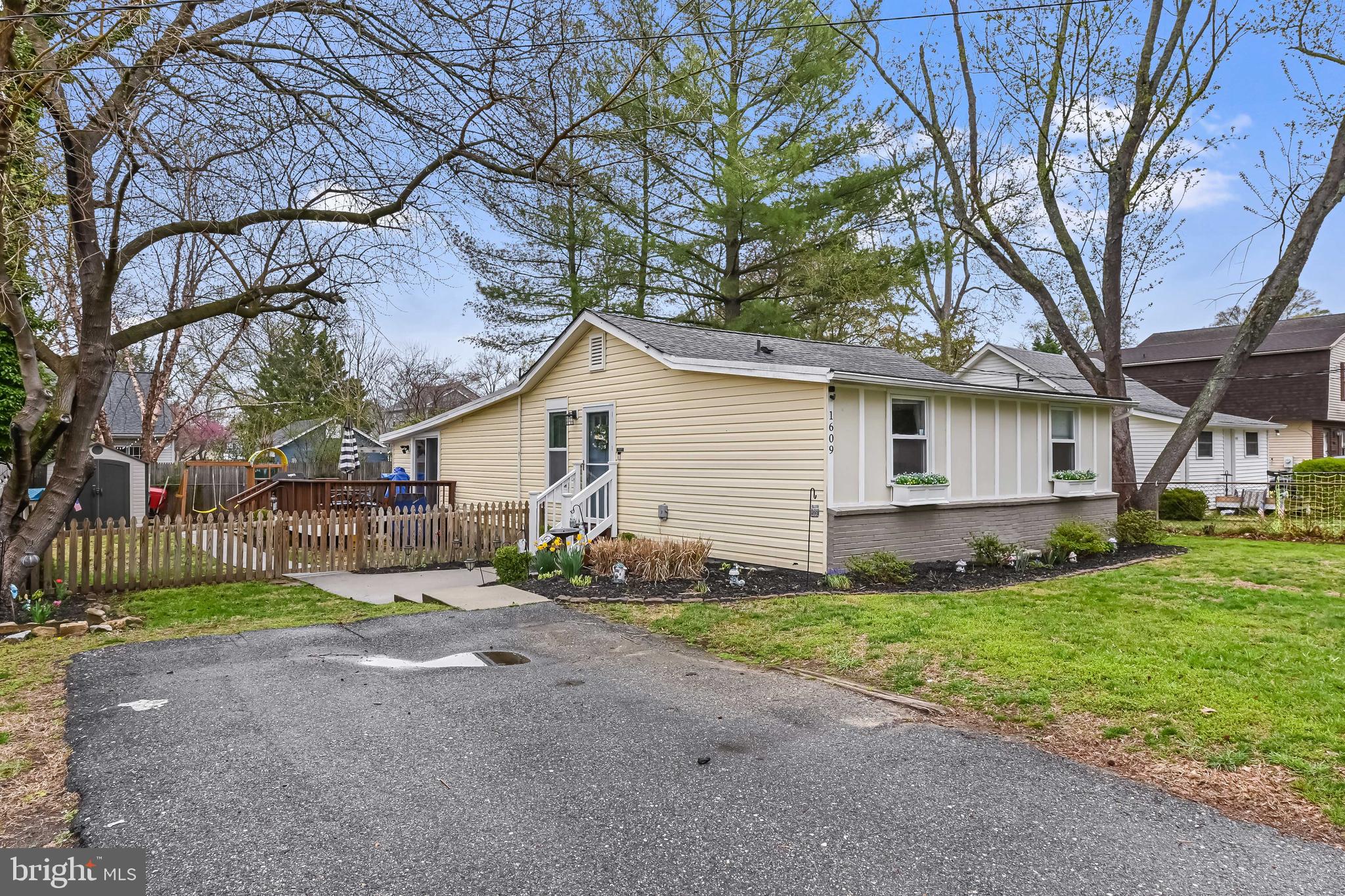 1609 Rockhold Road Edgewater, MD 21037 - Photo 3 of 35 a view of a house with a yard
