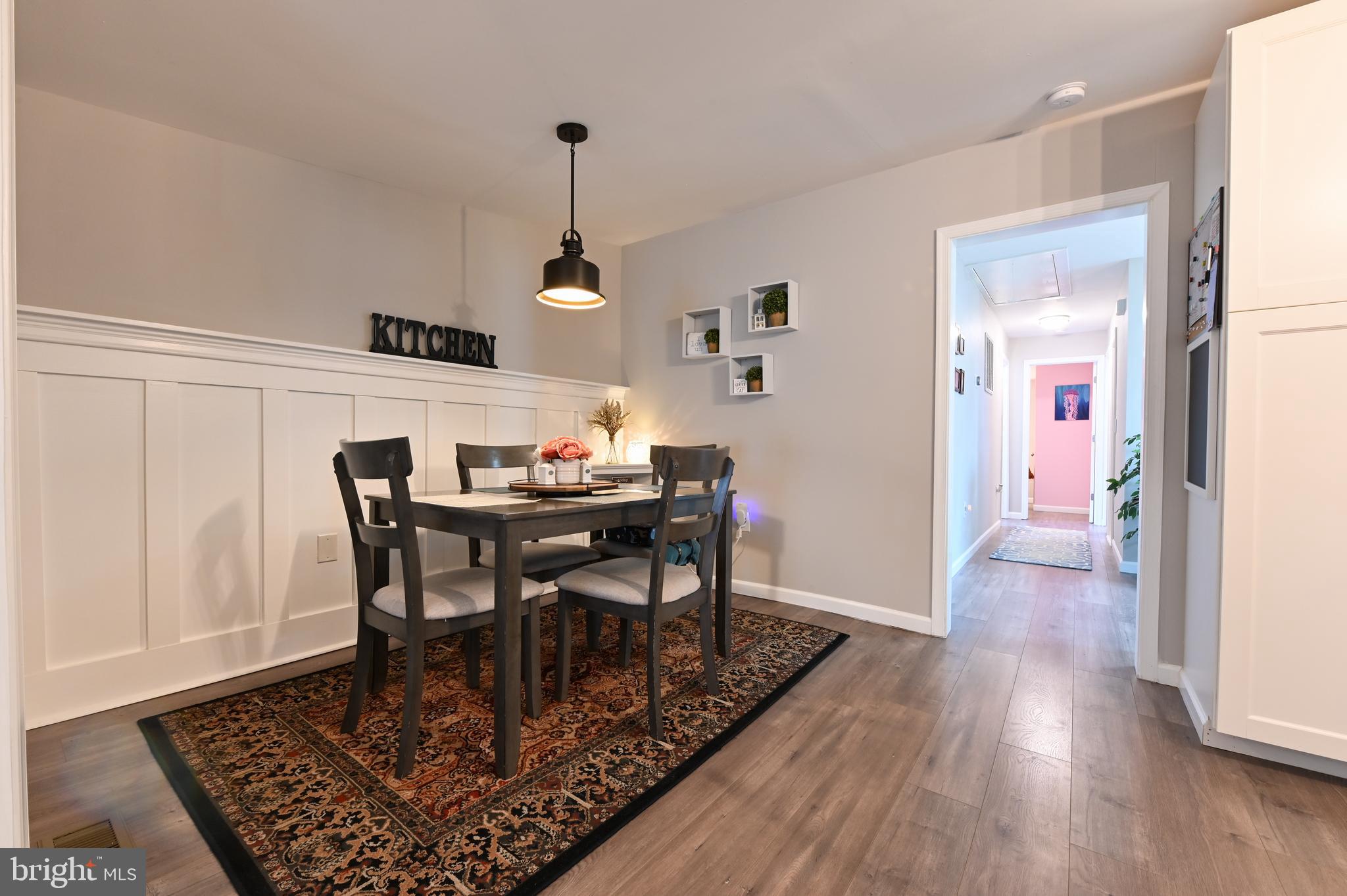 1609 Rockhold Road Edgewater, MD 21037 - Photo 9 of 35 a view of a dining room with furniture and wooden floor