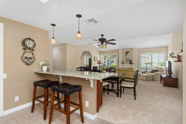 a view of a dining room with furniture