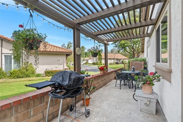 a garden view with a seating space