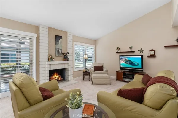 a living room with furniture or couch and a flat screen tv