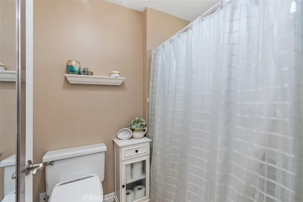 a bathroom with a toilet and a sink