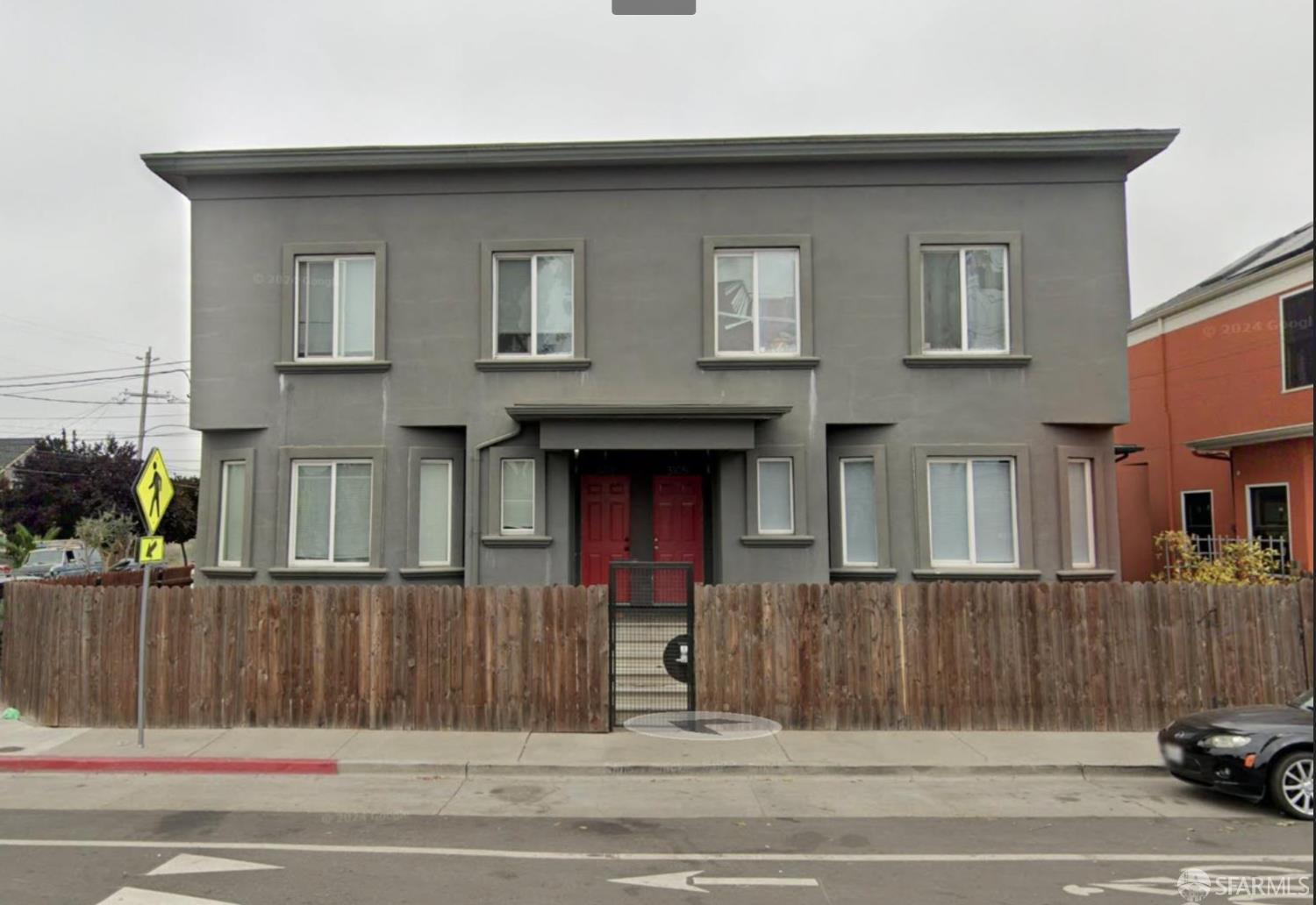 3101-3107 West Street Oakland, CA 94608 - Photo 4 of 4 a view of a house with a balcony