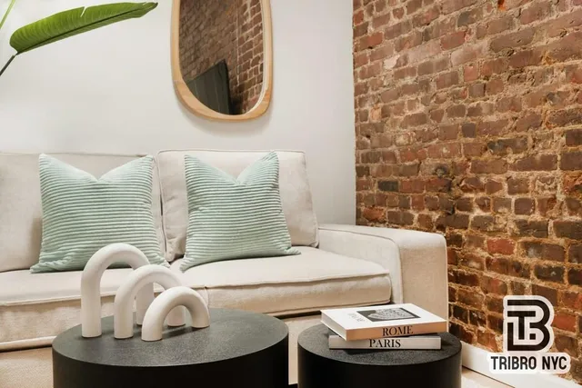a bathroom with a toilet and a sink