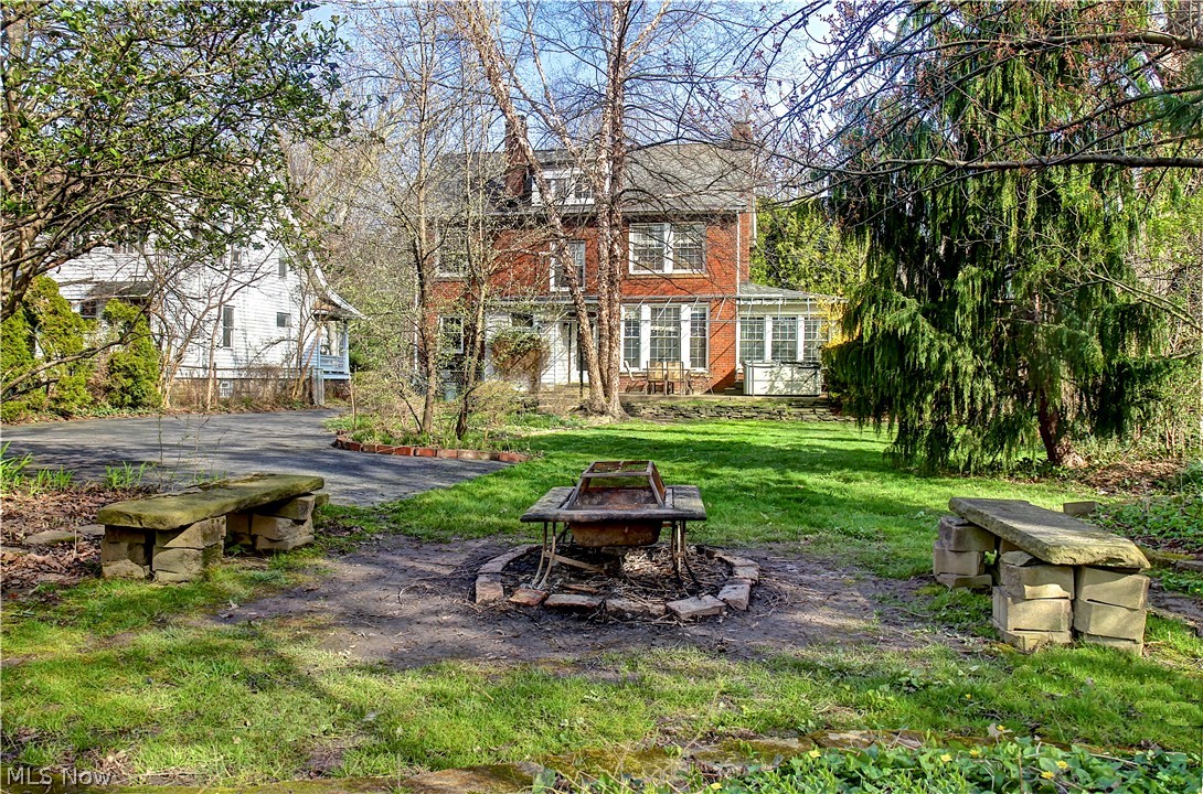 3054 Somerton Road Cleveland, OH 44118 - Photo 39 of 40 View of yard featuring a fire pit