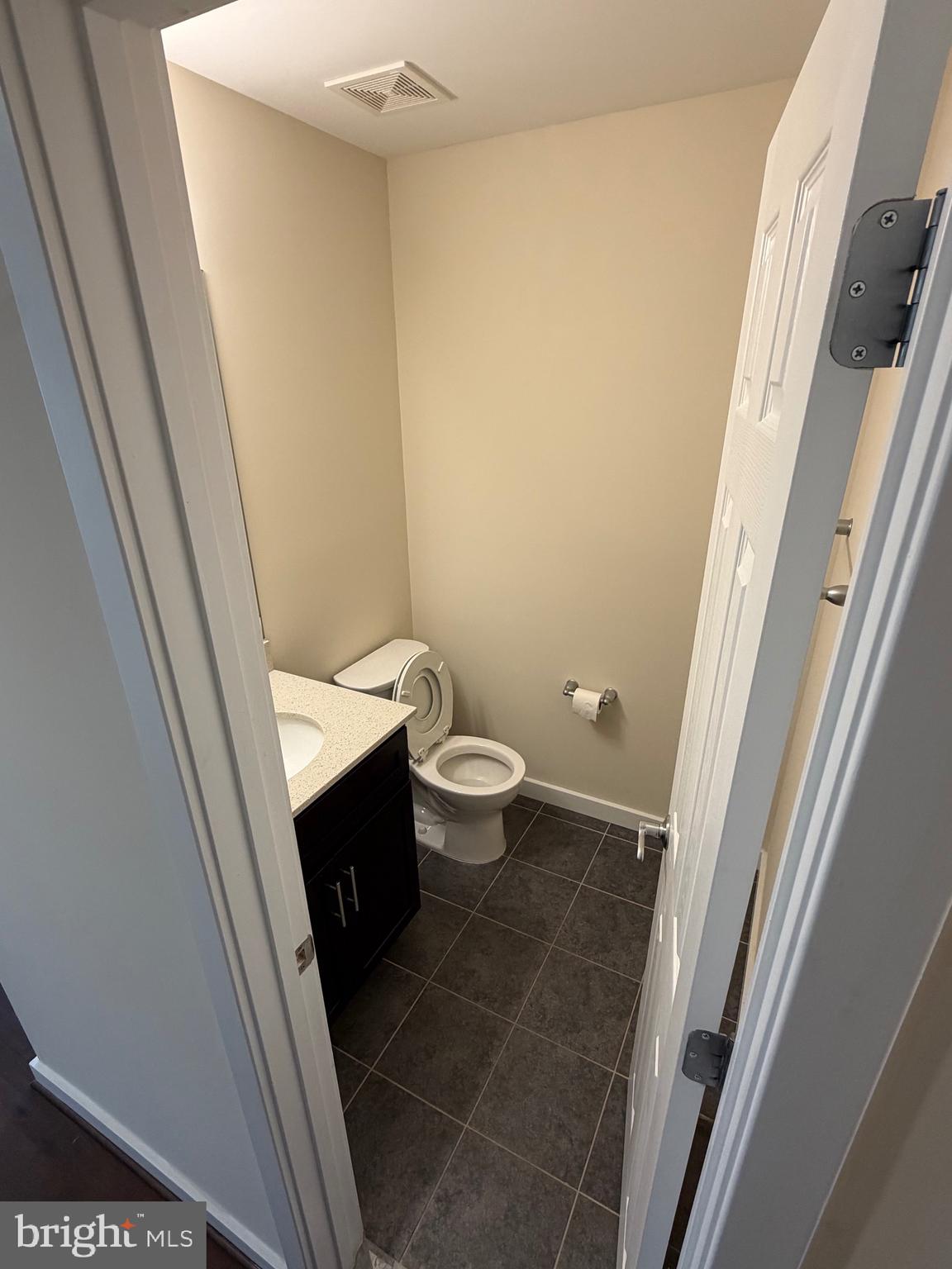 3303 Demirel Way, Unit D Ellicott City, MD 21042 - Photo 14 of 34 a bathroom with a sink and toilet