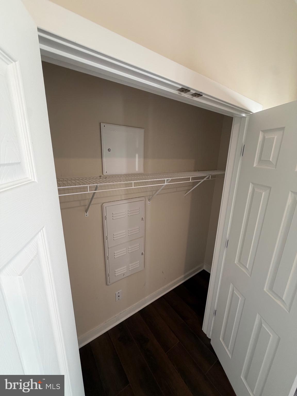 3303 Demirel Way, Unit D Ellicott City, MD 21042 - Photo 19 of 34 a view of storage and utility room with wooden floor