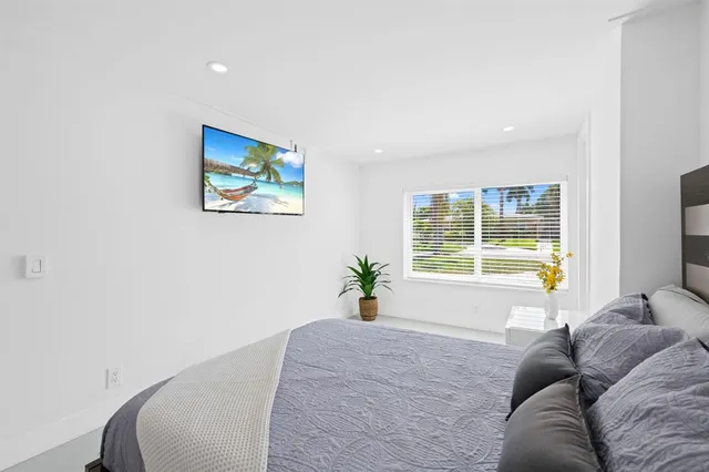 a living room with furniture and window