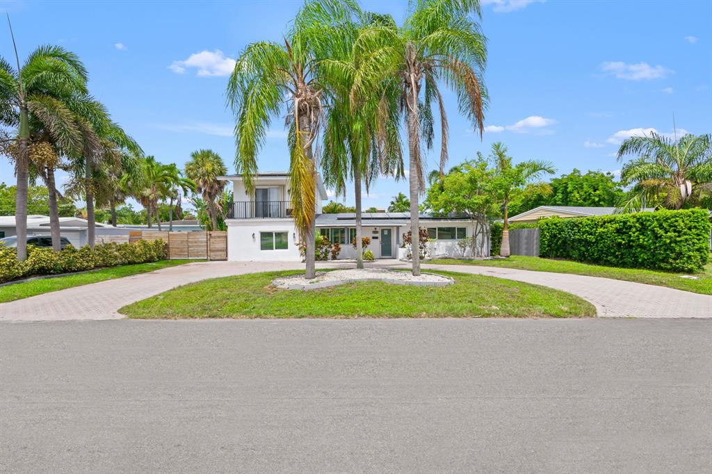 865 Northeast 23rd Terrace Pompano Beach, FL 33062 - Photo 29 of 33 a view of green field with sign board