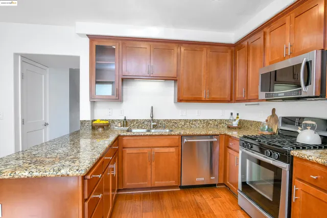 a hallway with sink and mirror