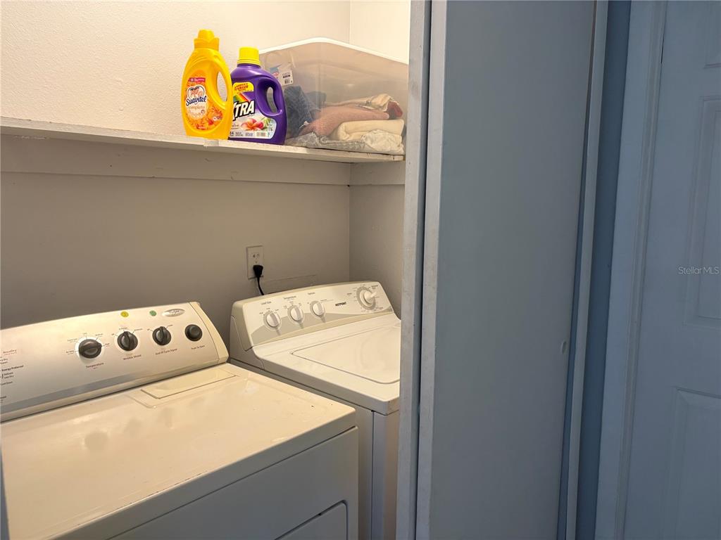310 Cherokee Court, Unit D Altamonte Springs, FL 32701 - Photo 15 of 22 a utility room with dryer and washer