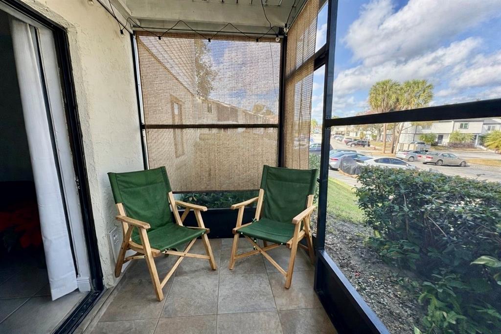 310 Cherokee Court, Unit D Altamonte Springs, FL 32701 - Photo 16 of 22 a view of a chair and table in the balcony