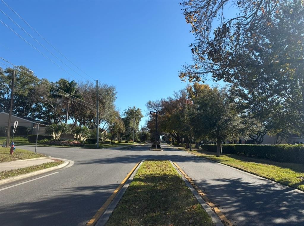 310 Cherokee Court, Unit D Altamonte Springs, FL 32701 - Photo 17 of 22 a view of swimming pool with a yard