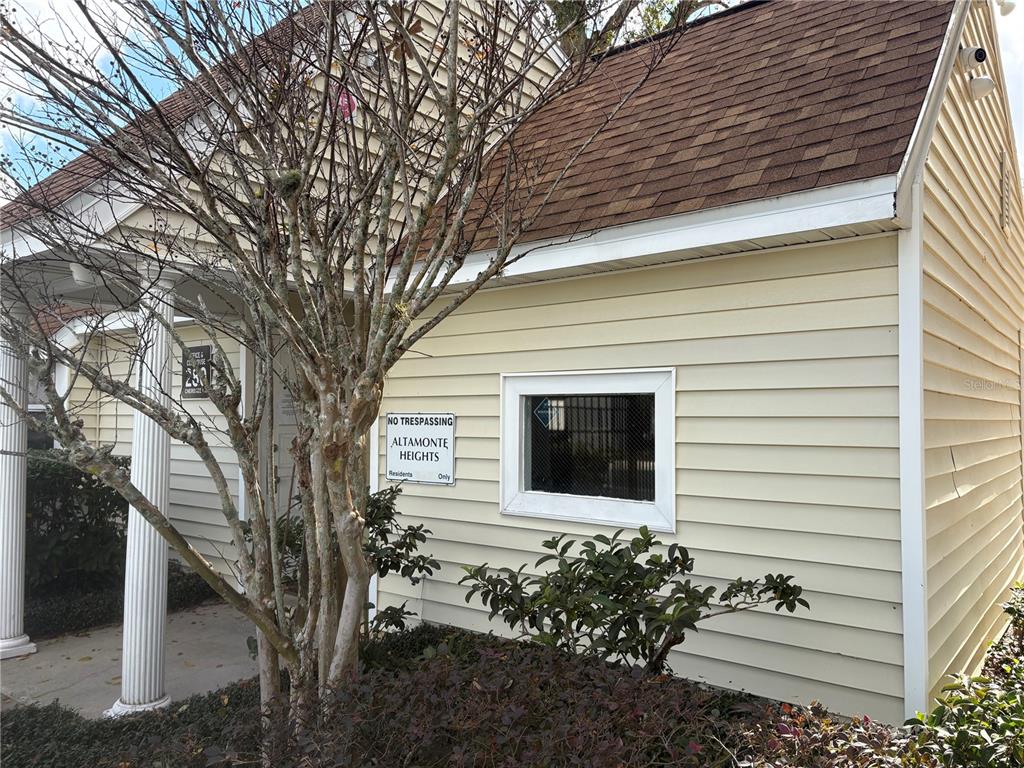 310 Cherokee Court, Unit D Altamonte Springs, FL 32701 - Photo 18 of 22 a view of a house with a yard
