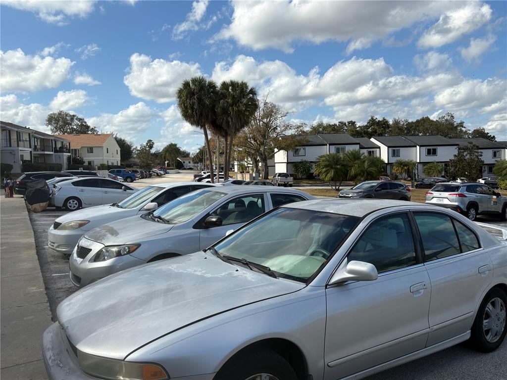 310 Cherokee Court, Unit D Altamonte Springs, FL 32701 - Photo 21 of 22 a view of cars parked on a street