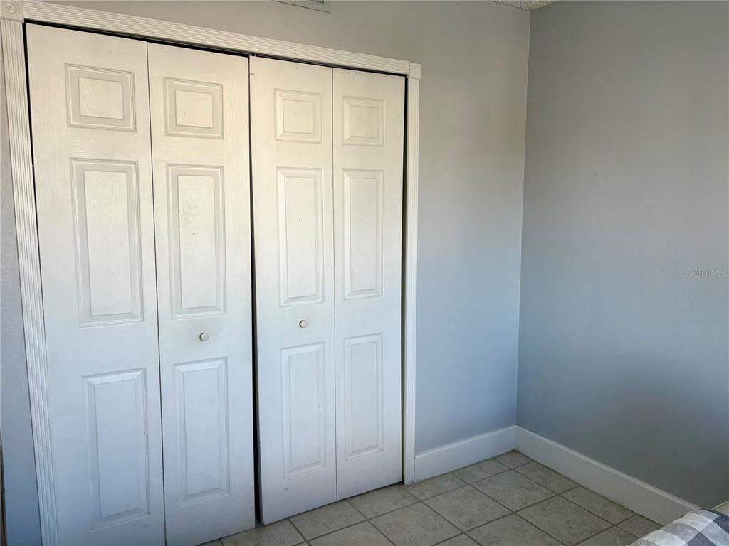310 Cherokee Court, Unit D Altamonte Springs, FL 32701 - Photo 10 of 22 an empty room with a wooden door