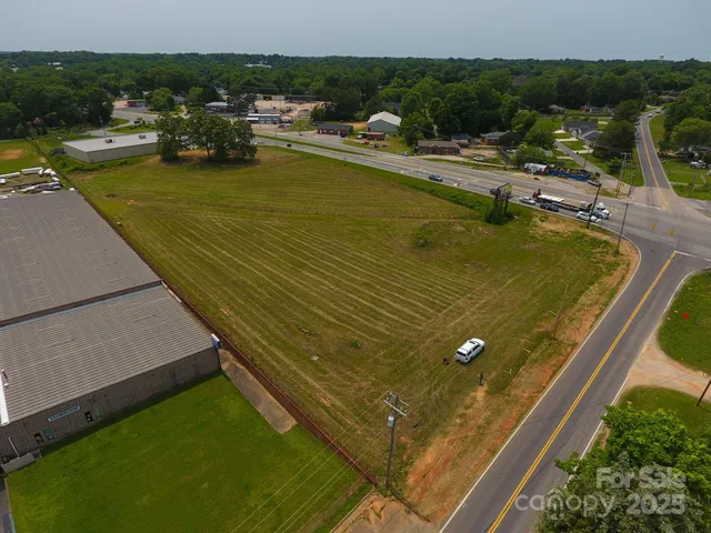 a view of a lake with a yard