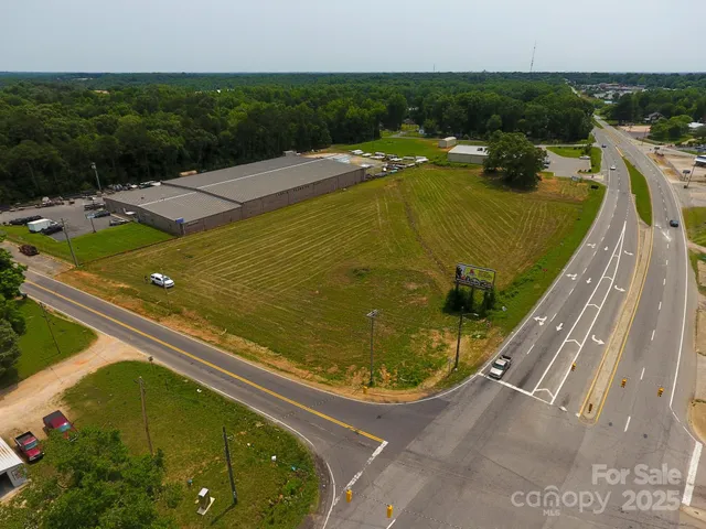 a view of a swimming pool with a yard