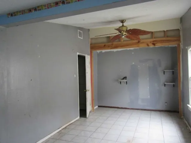 a view of a hallway with closet