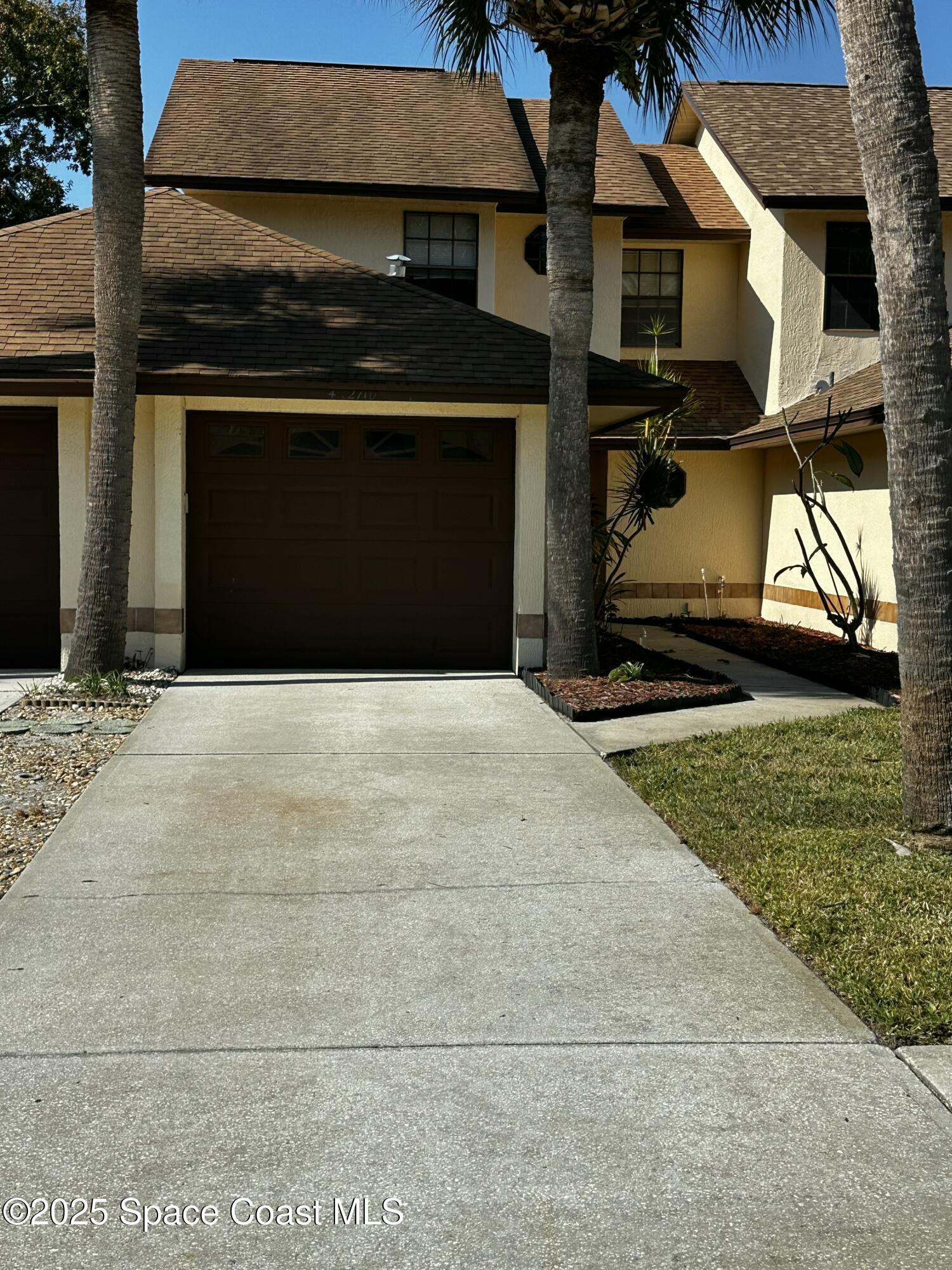 2710 Park Pl Boulevard, Unit 4 Melbourne, FL 32935 - Photo 8 of 16 a view of an entrance of the house