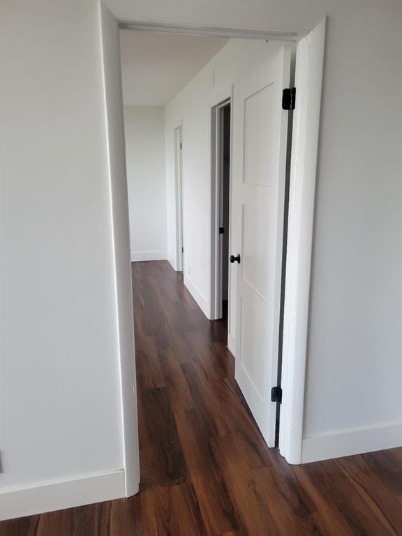 4222 Inverrary Boulevard, Unit 4413 Lauderhill, FL 33319 - Photo 16 of 34 a view of a hallway with wooden floor