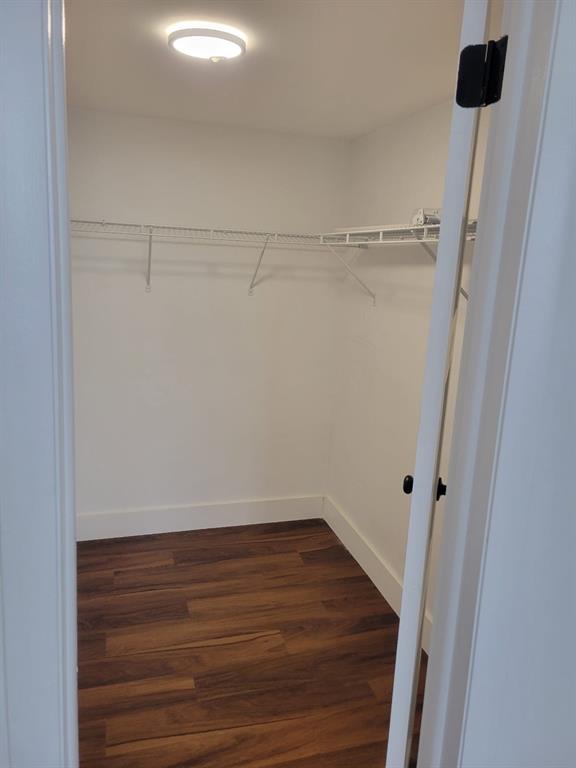 4222 Inverrary Boulevard, Unit 4413 Lauderhill, FL 33319 - Photo 23 of 34 a view of a room with wooden floor