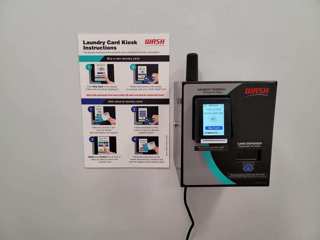 4222 Inverrary Boulevard, Unit 4413 Lauderhill, FL 33319 - Photo 28 of 34 Laundry paying system