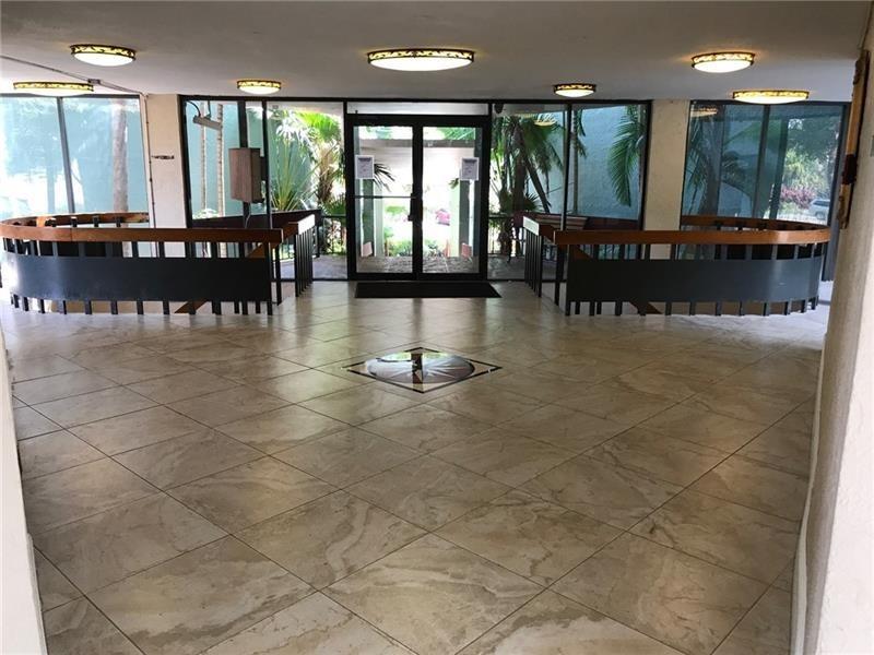 4222 Inverrary Boulevard, Unit 4413 Lauderhill, FL 33319 - Photo 7 of 34 Lobby from inside