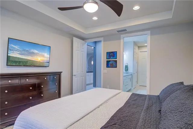 a bedroom with bed and window