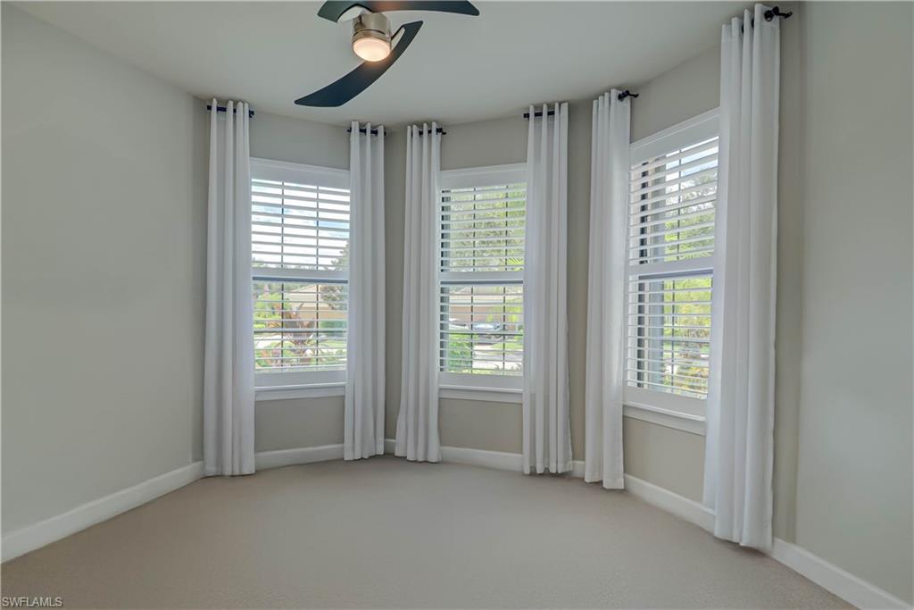 7938 Guadiana Way Ave Maria, FL 34142 - Photo 17 of 37 a view of an empty room with a window