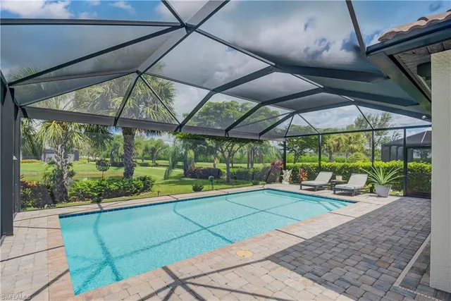 a workspace with furniture and window