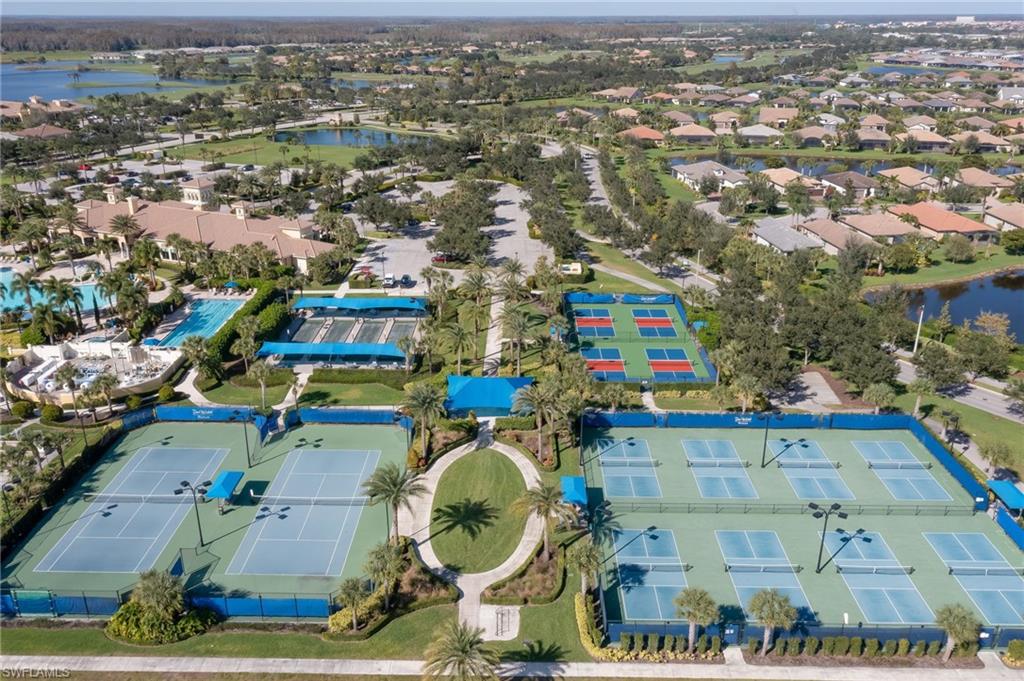 7938 Guadiana Way Ave Maria, FL 34142 - Photo 41 of 50 an aerial view of tennis court