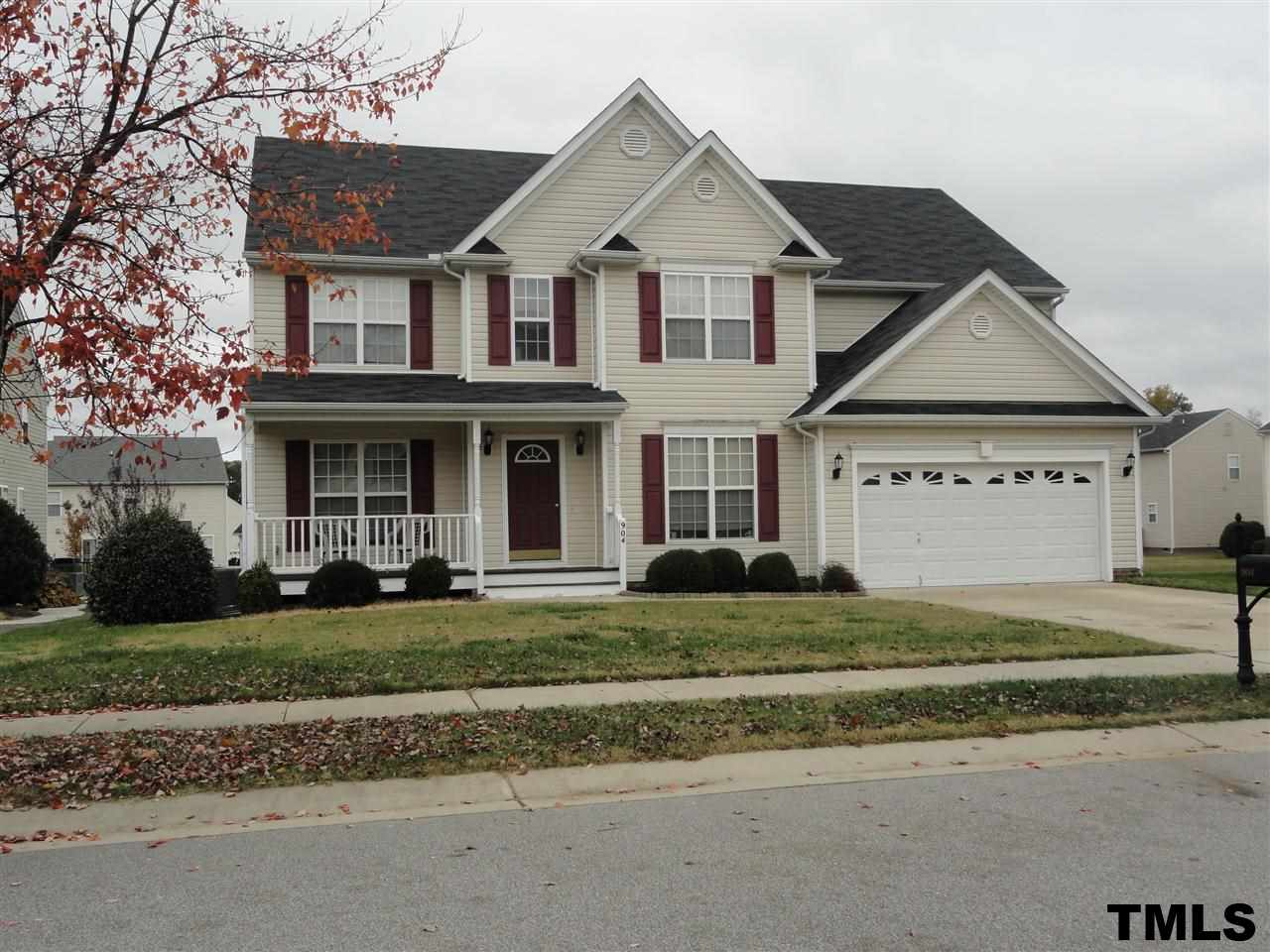 904 Morning Still Court Rolesville, NC 27571 - Photo 1 of 25 a view of a big house with a big yard and potted plants
