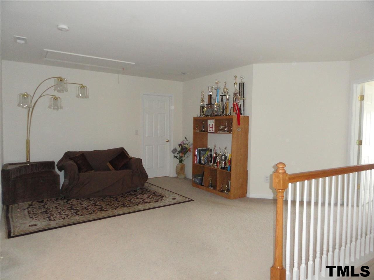 904 Morning Still Court Rolesville, NC 27571 - Photo 14 of 25 a living room with furniture